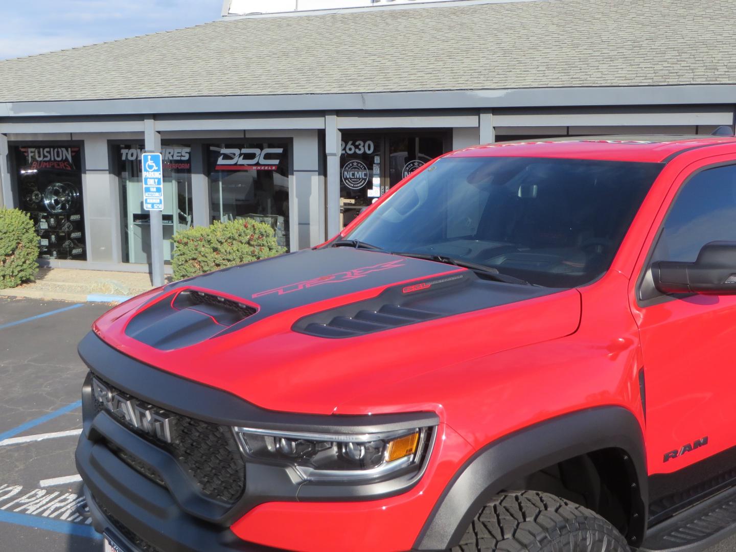 2023 Red /BLACK RAM 1500 Ram 1500 TRX Crew Cab 4x4 (1C6SRFU9XPN) with an 6.2L Supercharged HEMI V8 SRT engine, 8 Speed Auto 8HP95 transmission, located at 2630 Grass Valley Highway, Auburn, CA, 95603, (530) 508-5100, 38.937893, -121.095482 - Must see TRX featuring Eibach front and rear springs, 18" Method NV double black wheels, 37" Nitto Ridge Grappler tires, and window tint. - Photo#12